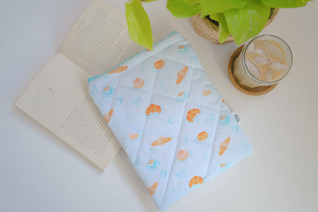 Quilted blue bakery book sleeve