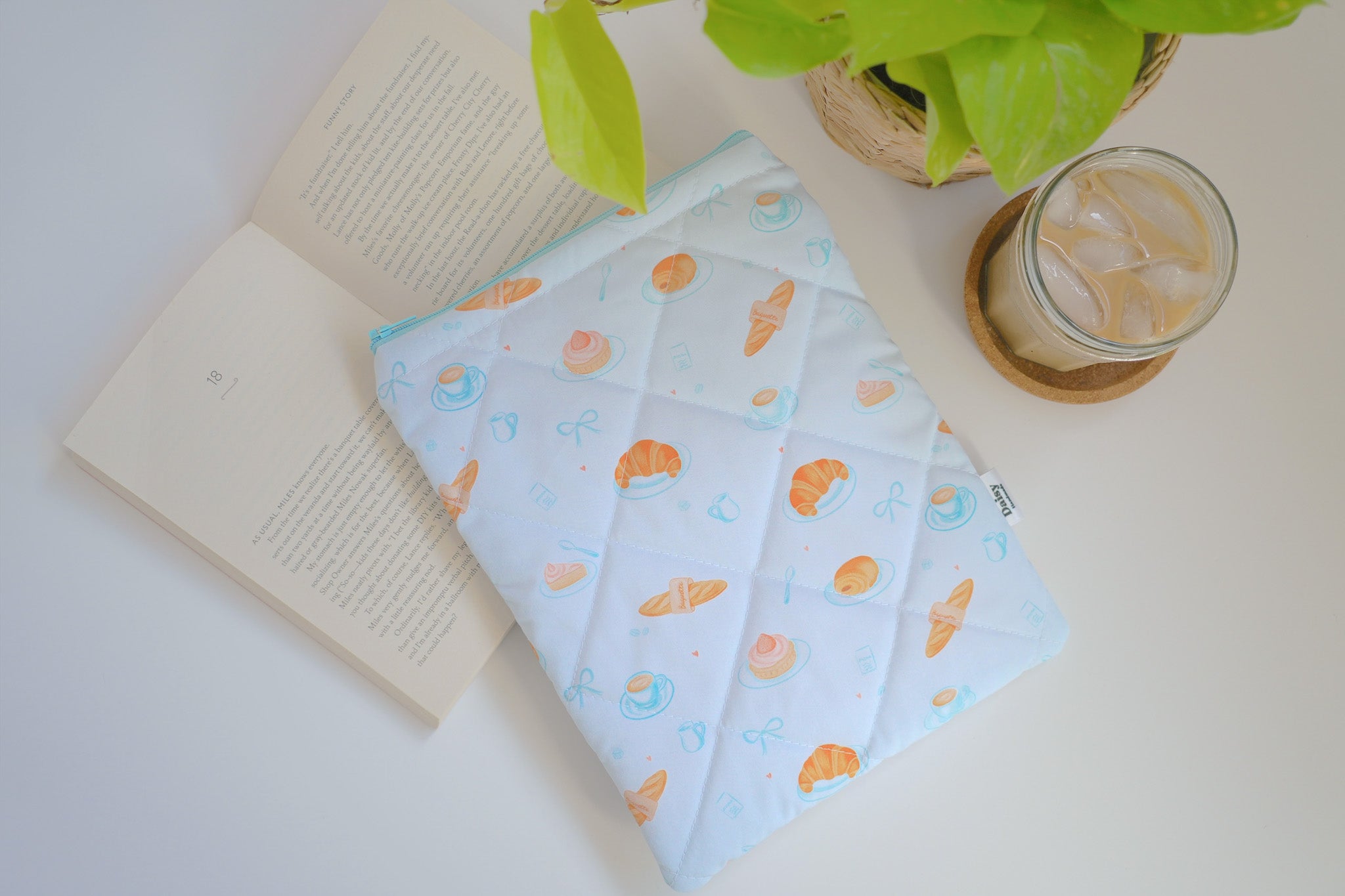 Quilted blue bakery book sleeve