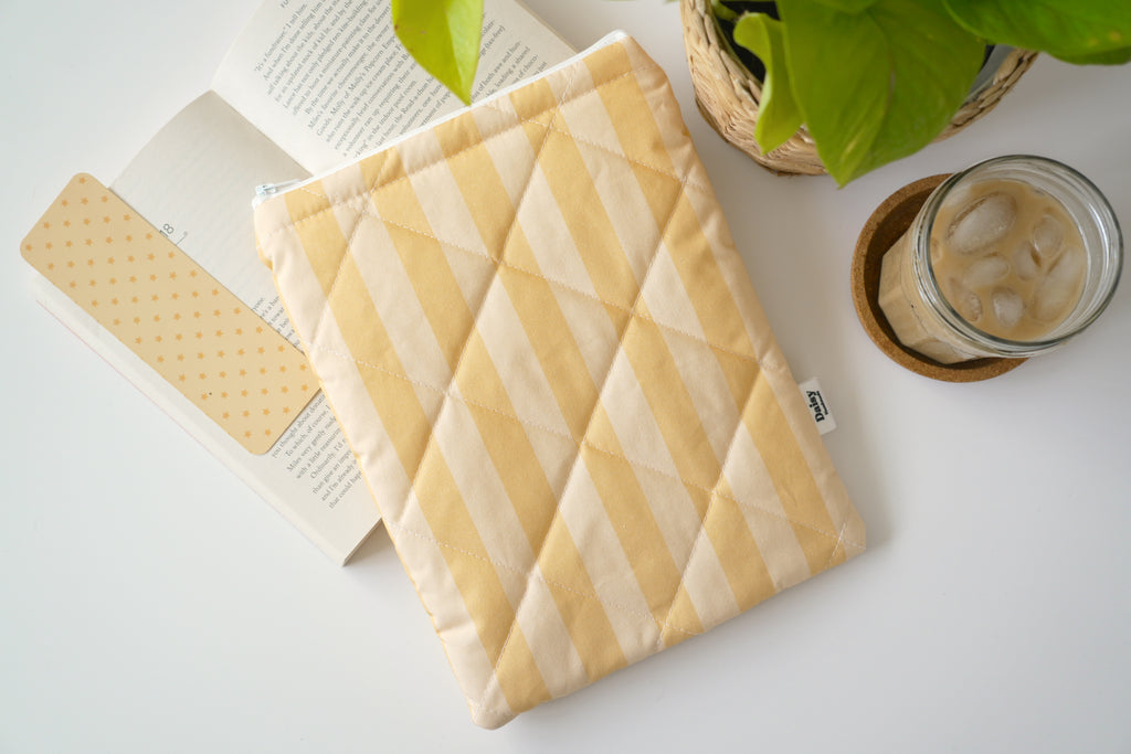 Quilted yellow stripe book sleeve