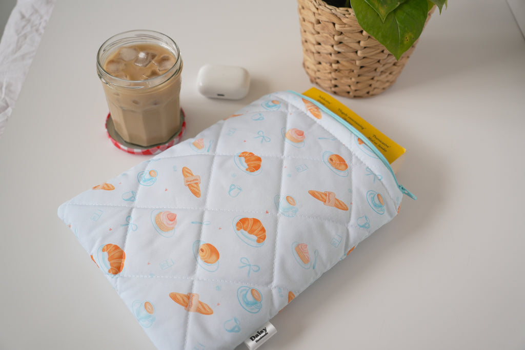 Quilted blue bakery book sleeve