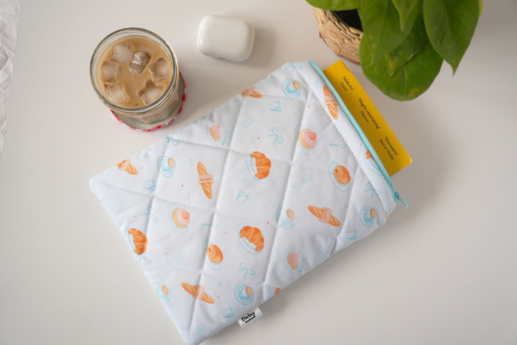Quilted blue bakery book sleeve