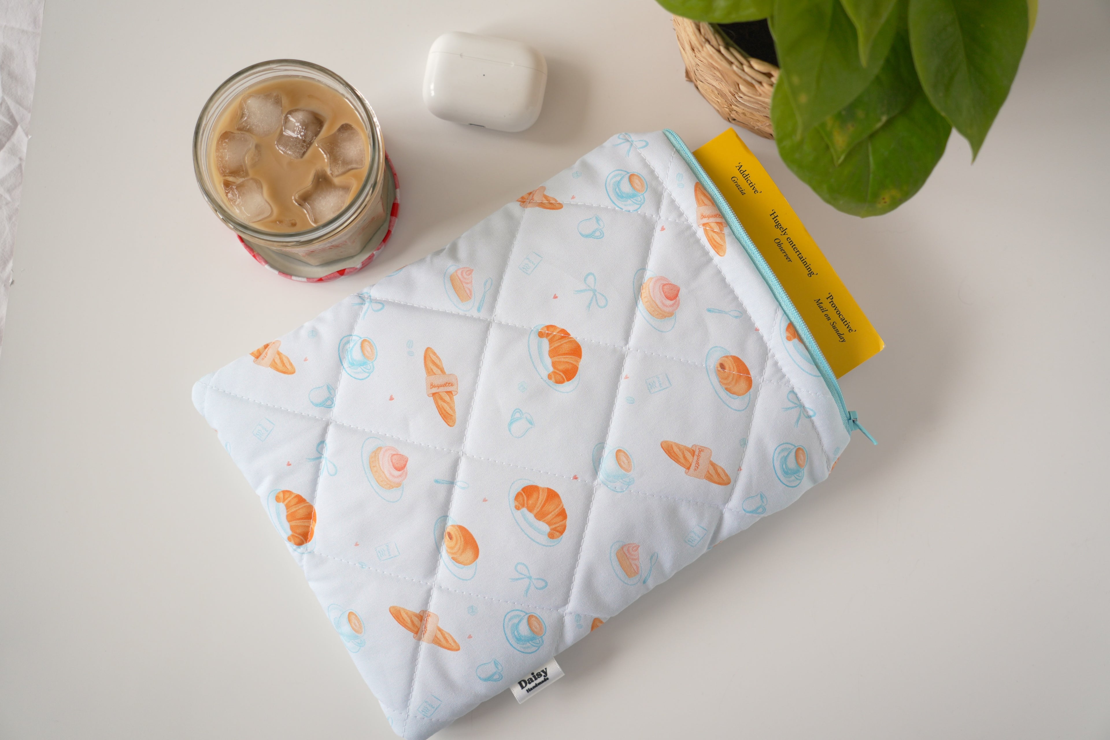 Quilted blue bakery book sleeve