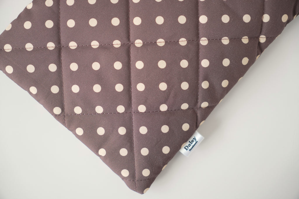 Quilted brown and yellow polka dot book sleeve