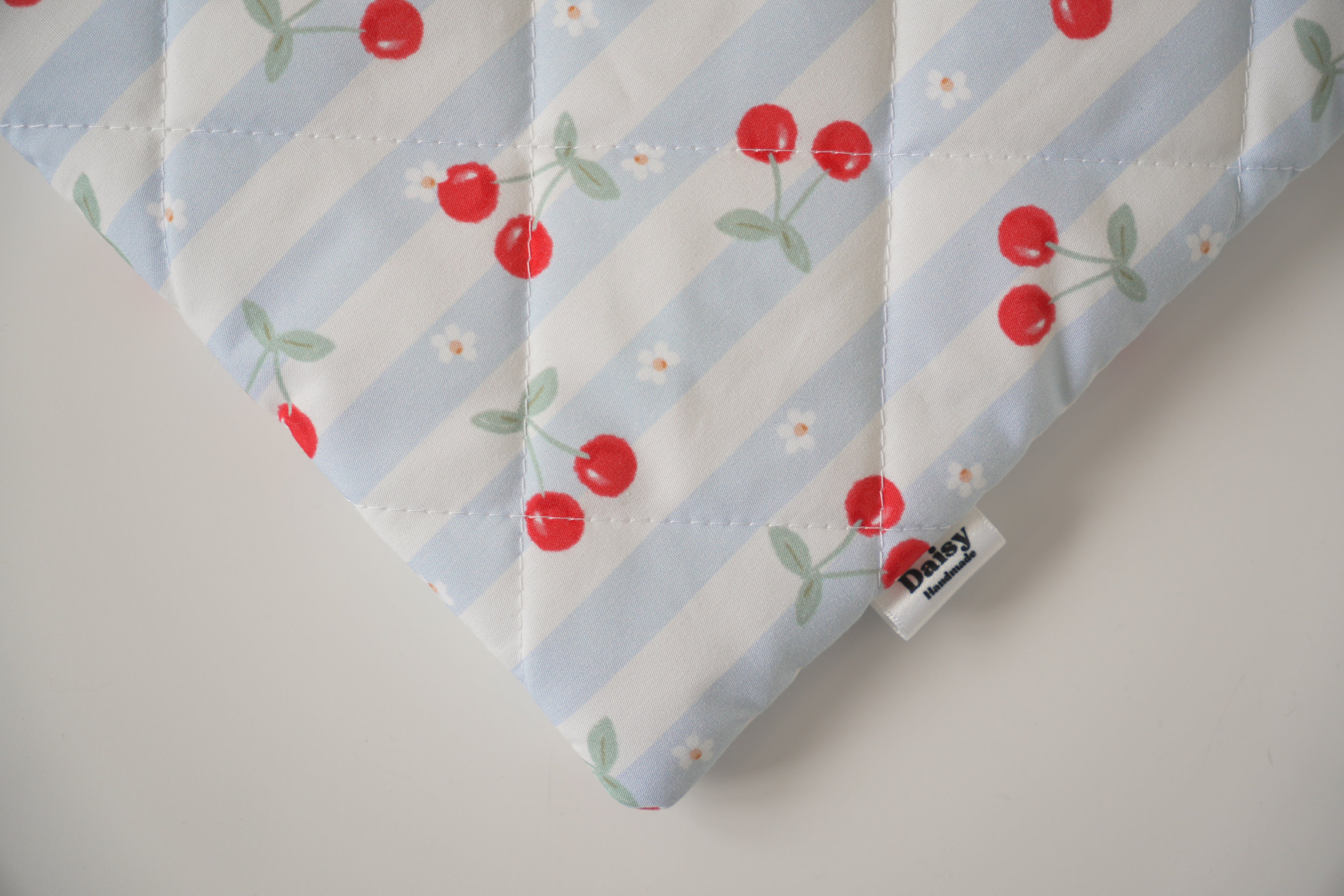 Quilted blue cherry stripe book sleeve