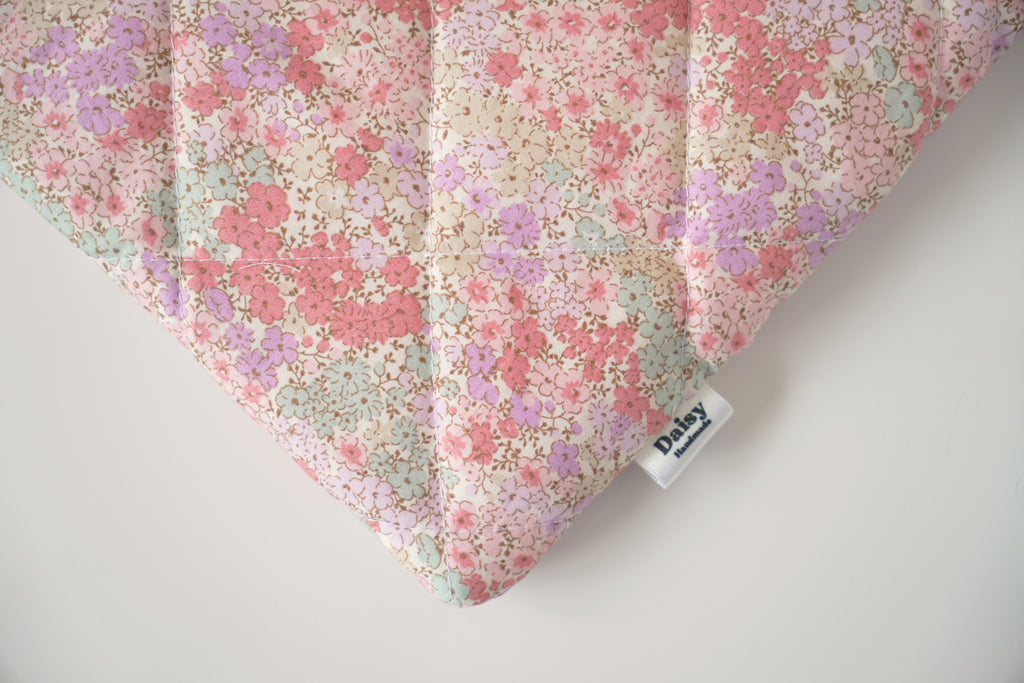 Quilted pink and teal floral book sleeve