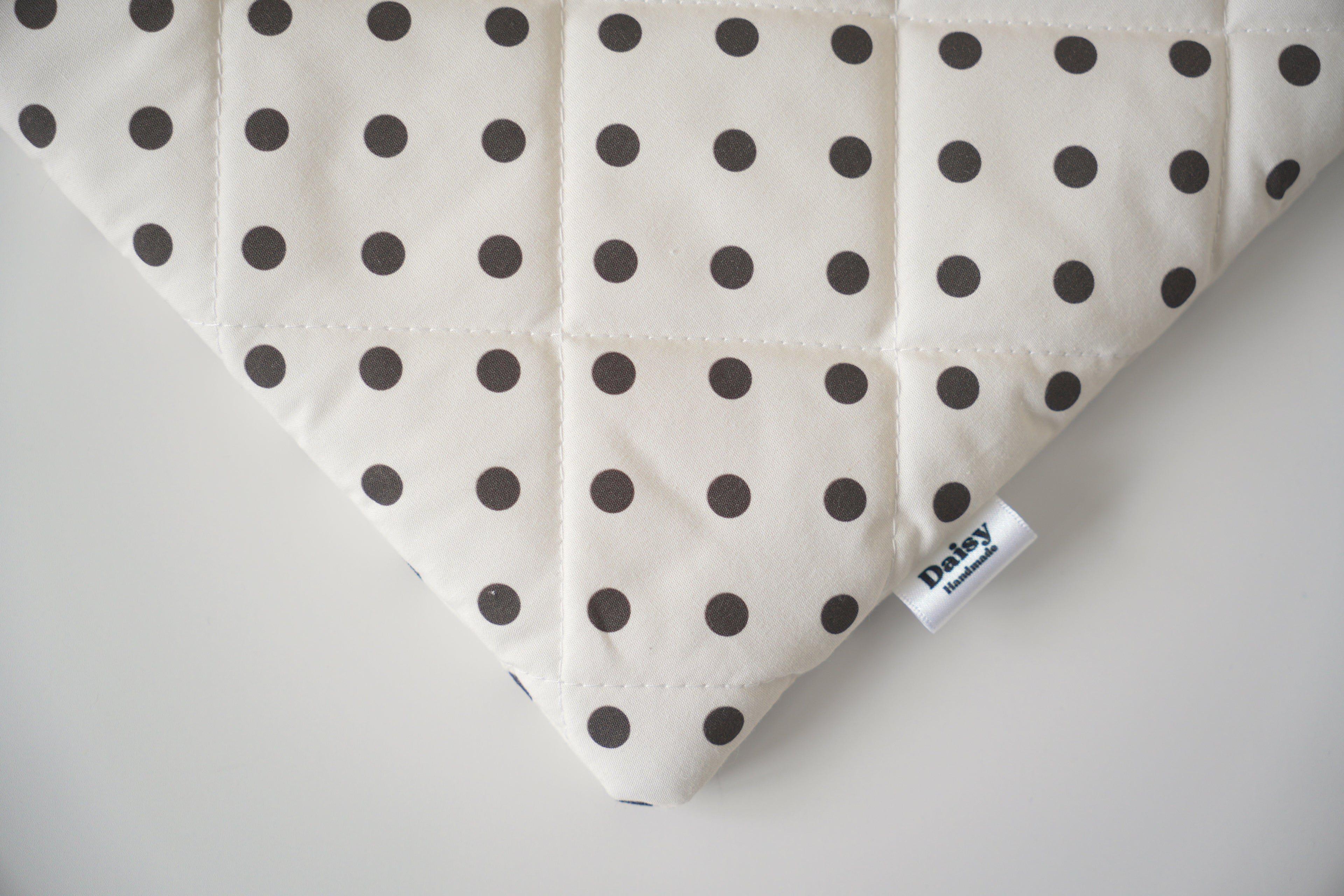 Quilted ivory and brown polka dot book sleeve