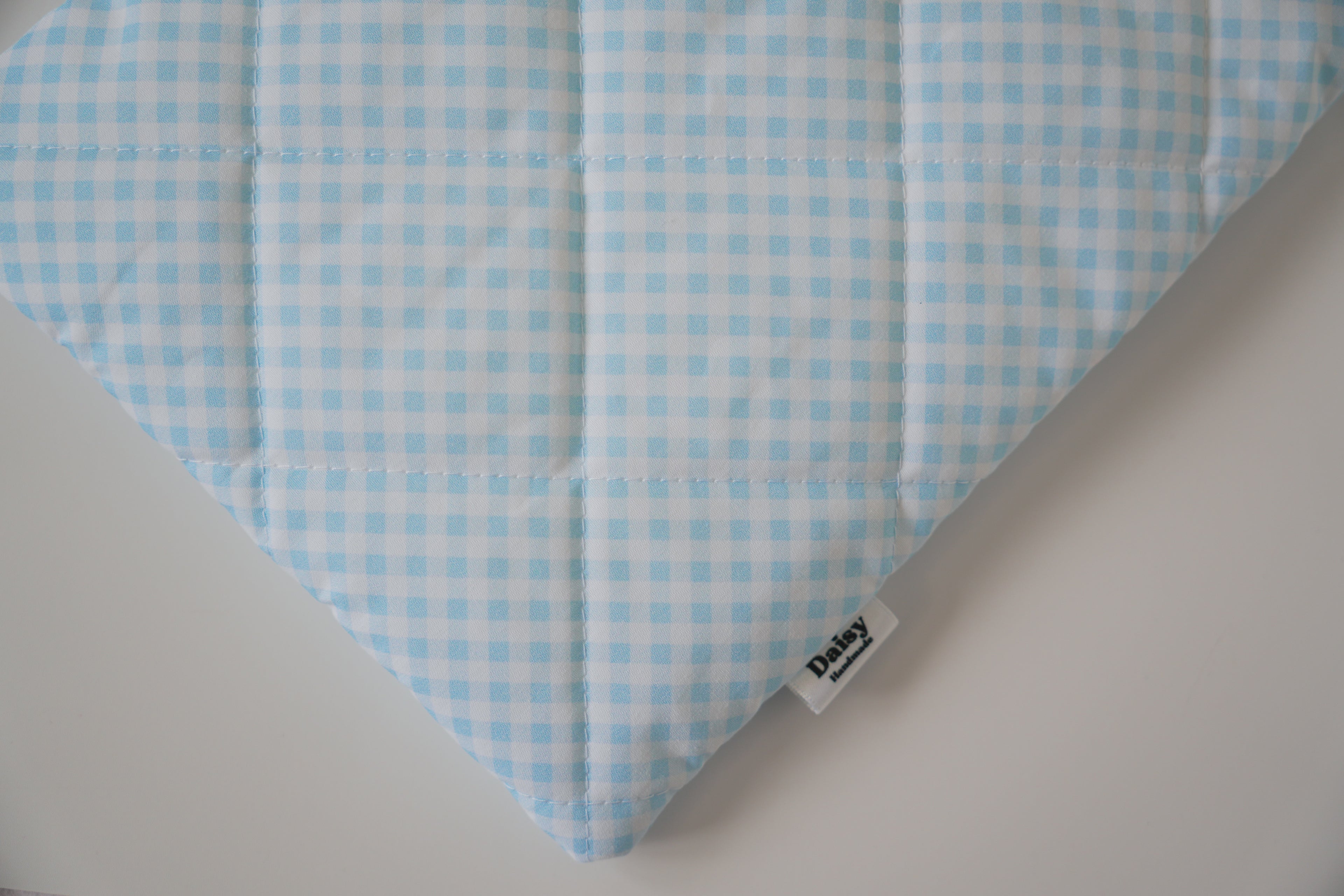 Quilted light blue diagonal gingham book sleeve