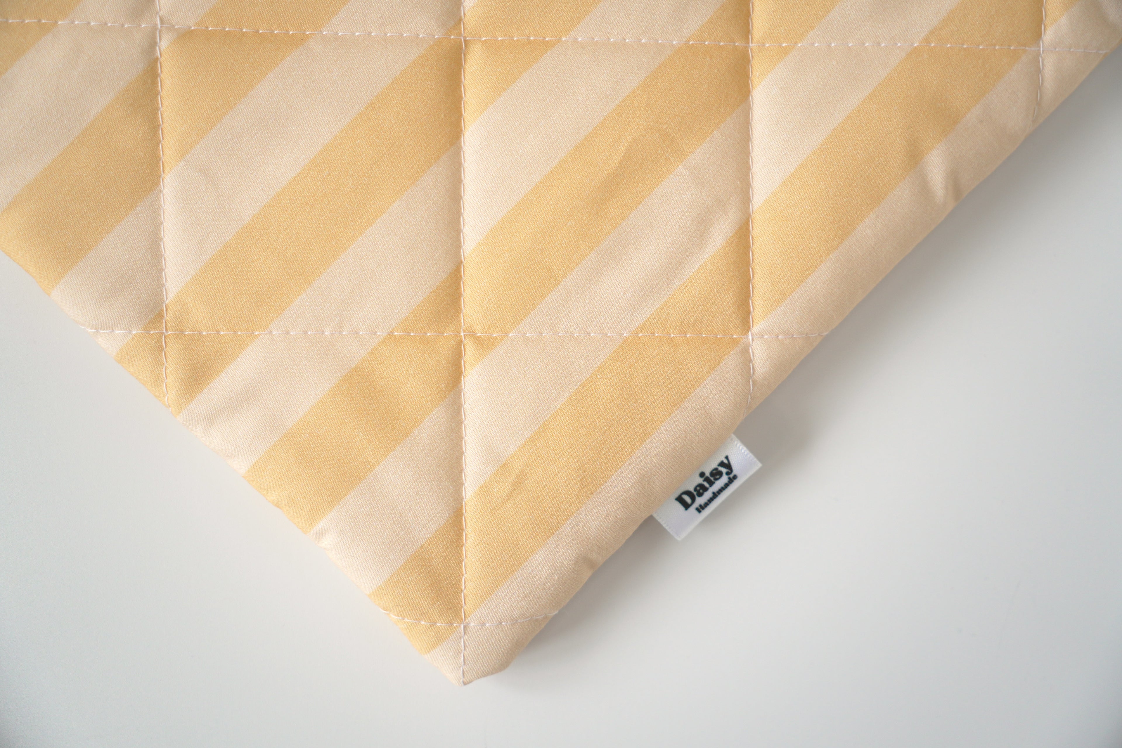 Quilted yellow stripe book sleeve