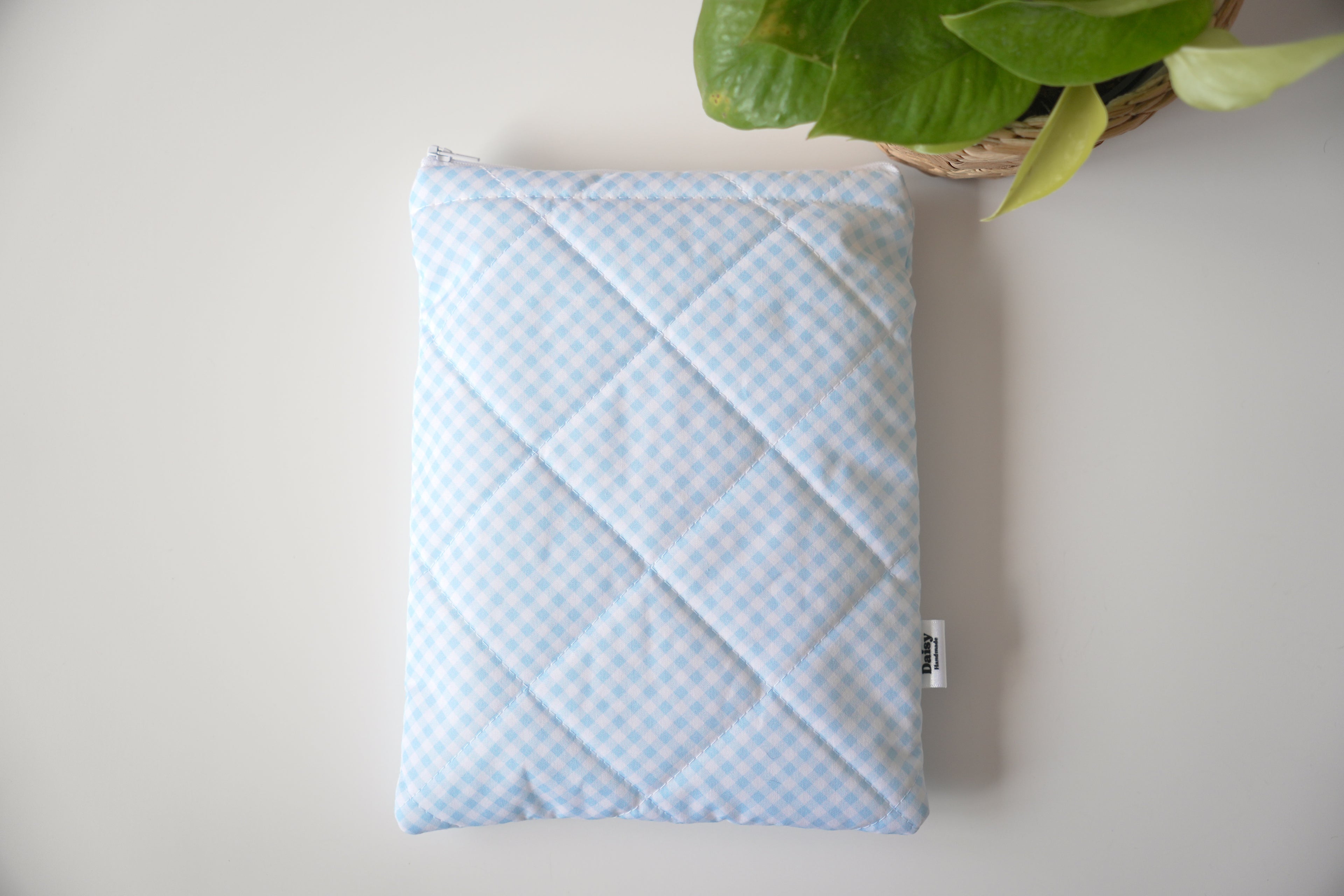 Quilted light blue diagonal gingham book sleeve