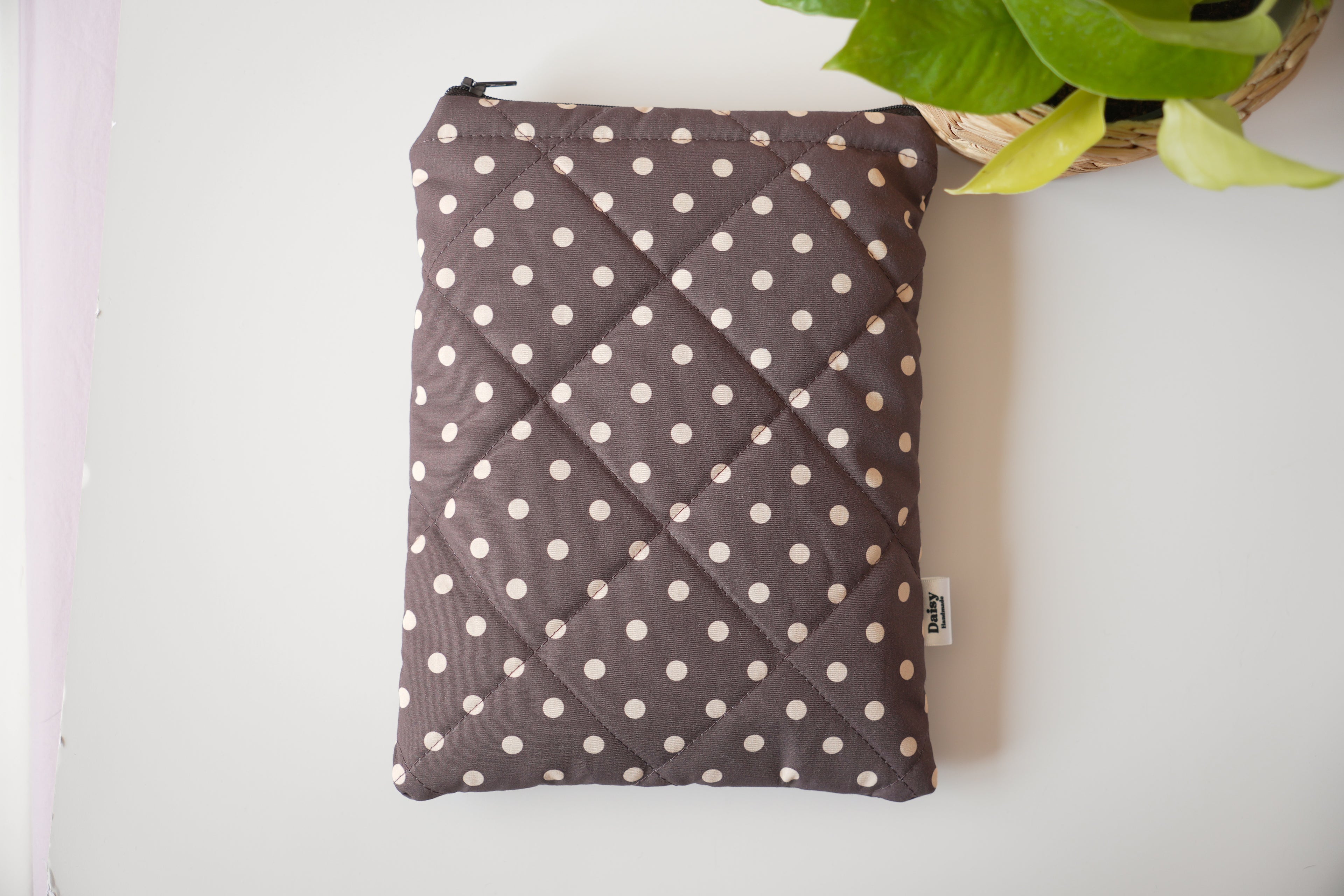 Quilted brown and yellow polka dot book sleeve