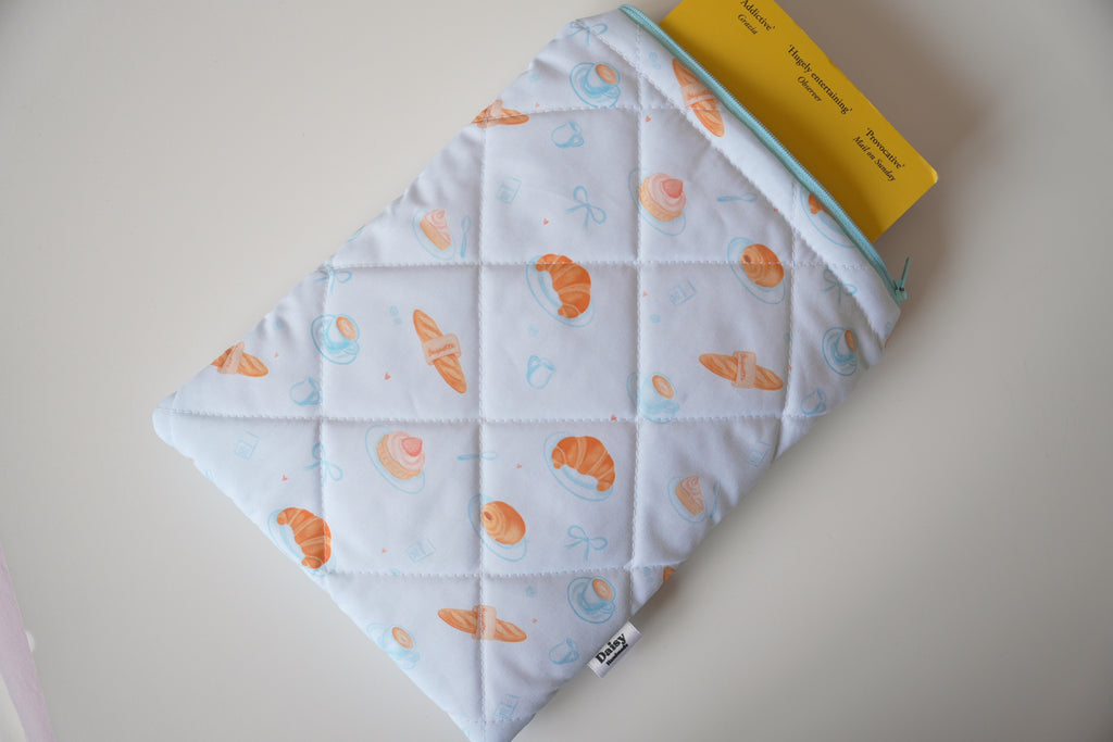 Quilted blue bakery book sleeve