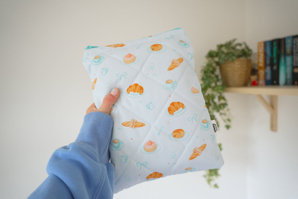 Quilted blue bakery book sleeve