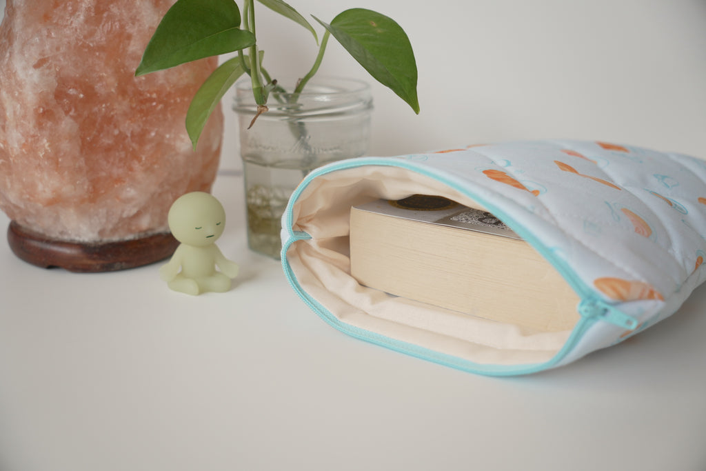 Quilted blue bakery book sleeve