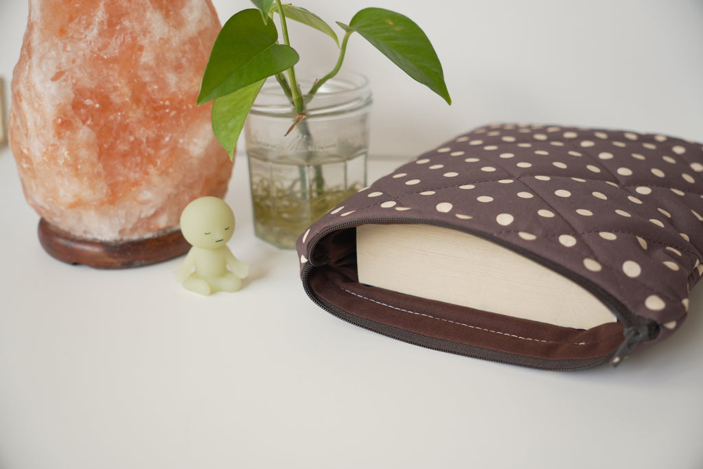 Quilted brown and yellow polka dot book sleeve