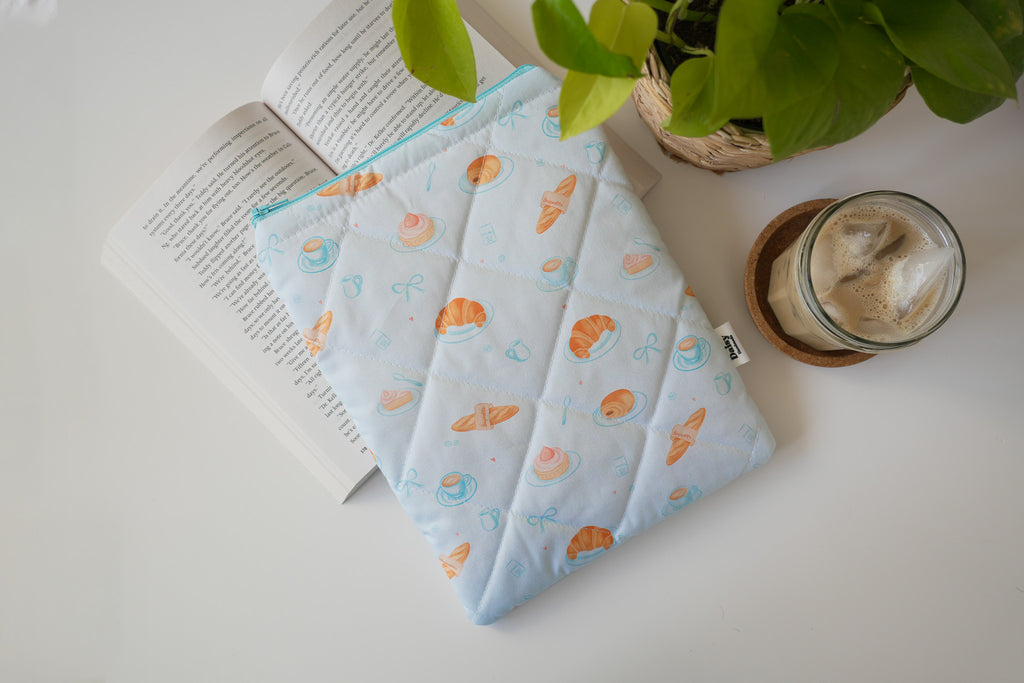 Quilted blue bakery book sleeve