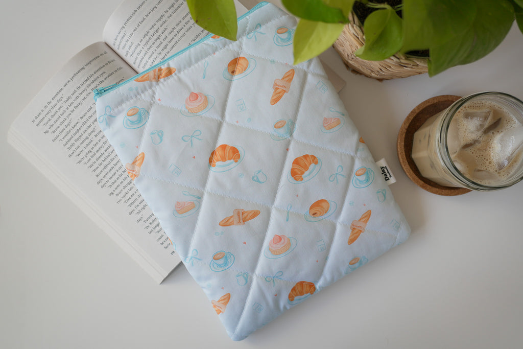 Quilted blue bakery book sleeve