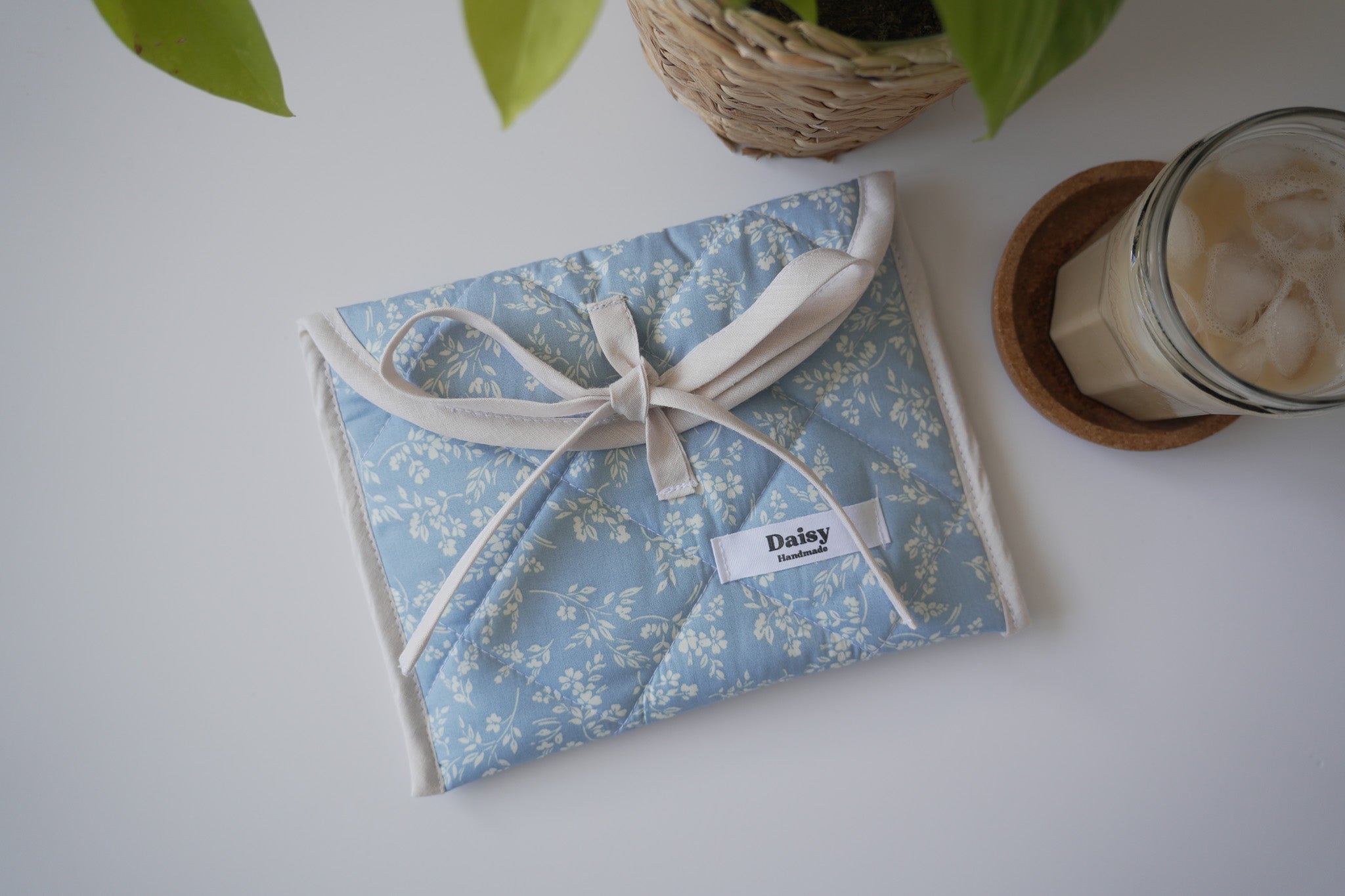 Quilted bow closure kindle sleeve in vintage blue floral