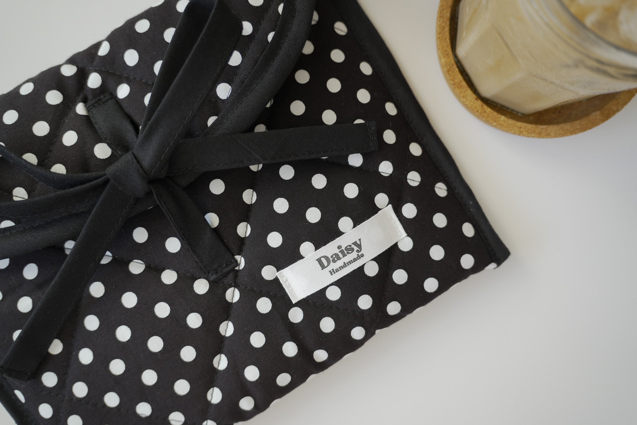 Quilted bow closure kindle sleeve black polka dot