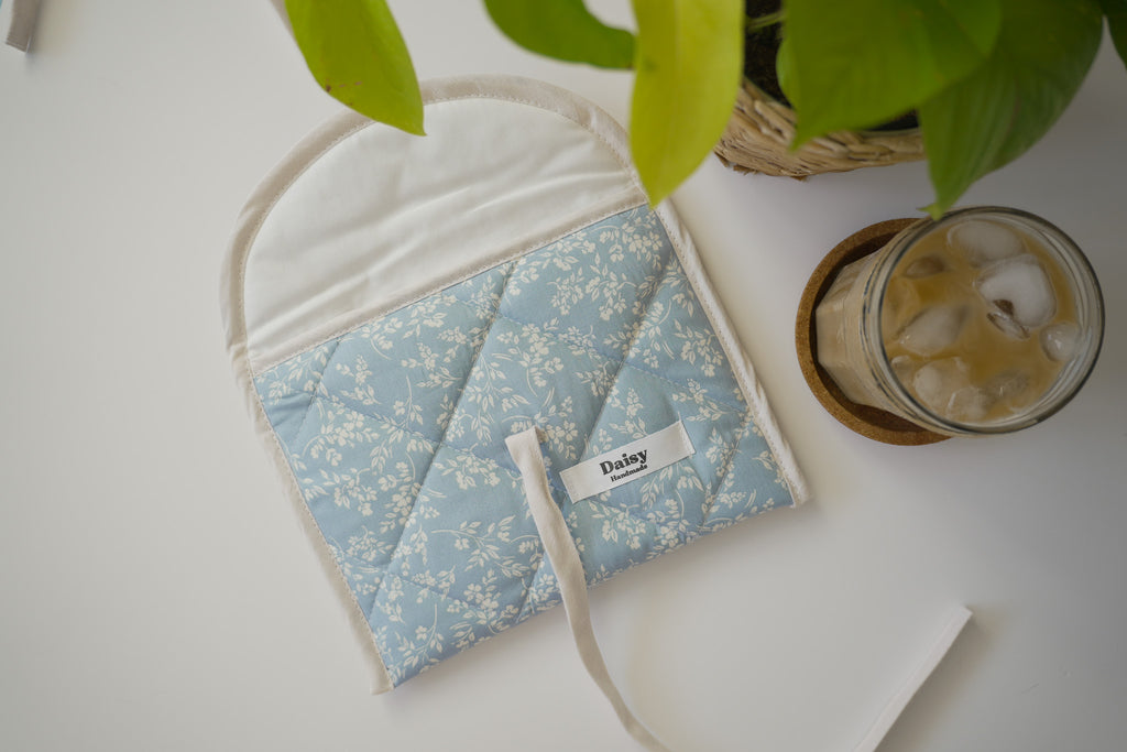 Quilted bow closure kindle sleeve in vintage blue floral