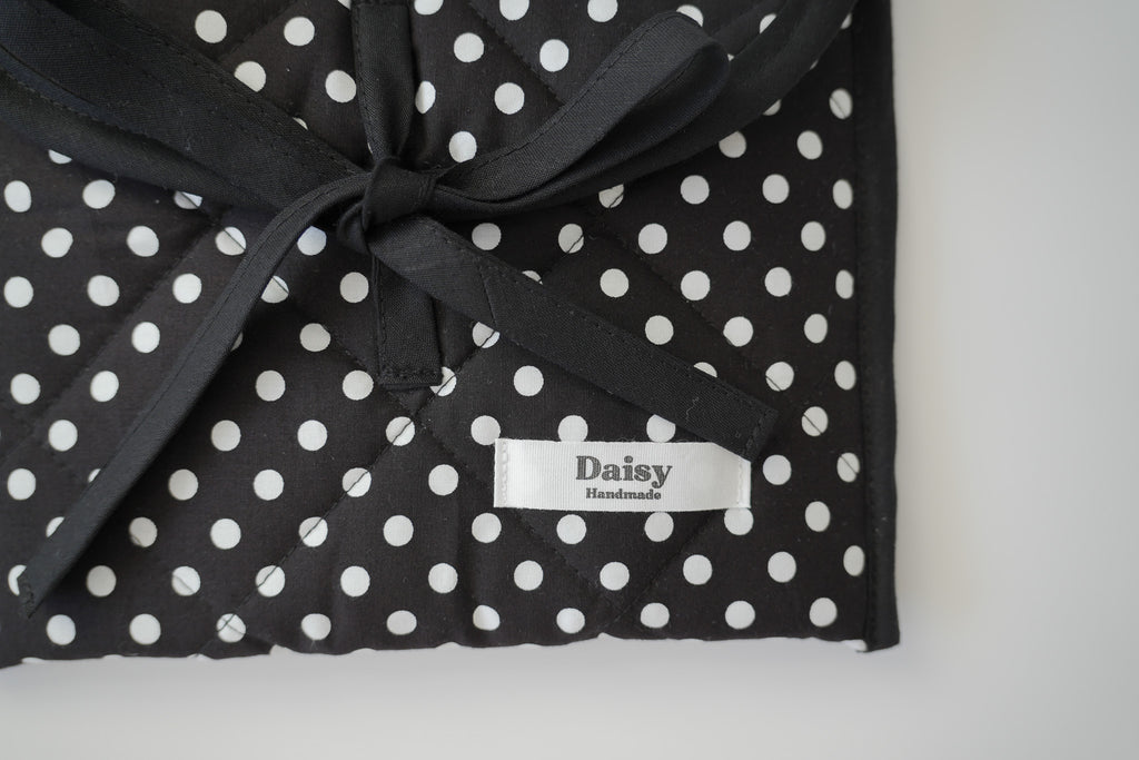Quilted bow closure kindle sleeve black polka dot
