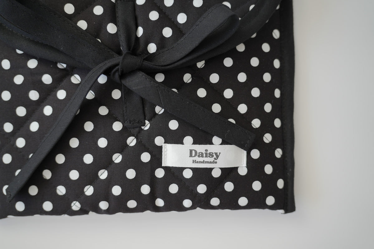 Quilted bow closure kindle sleeve black polka dot