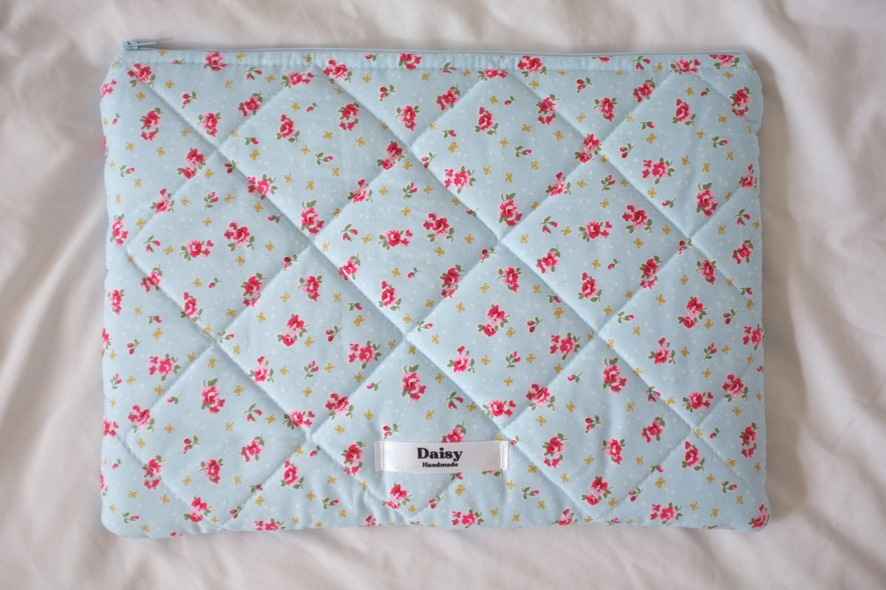 Laptop sleeve blue bow rose