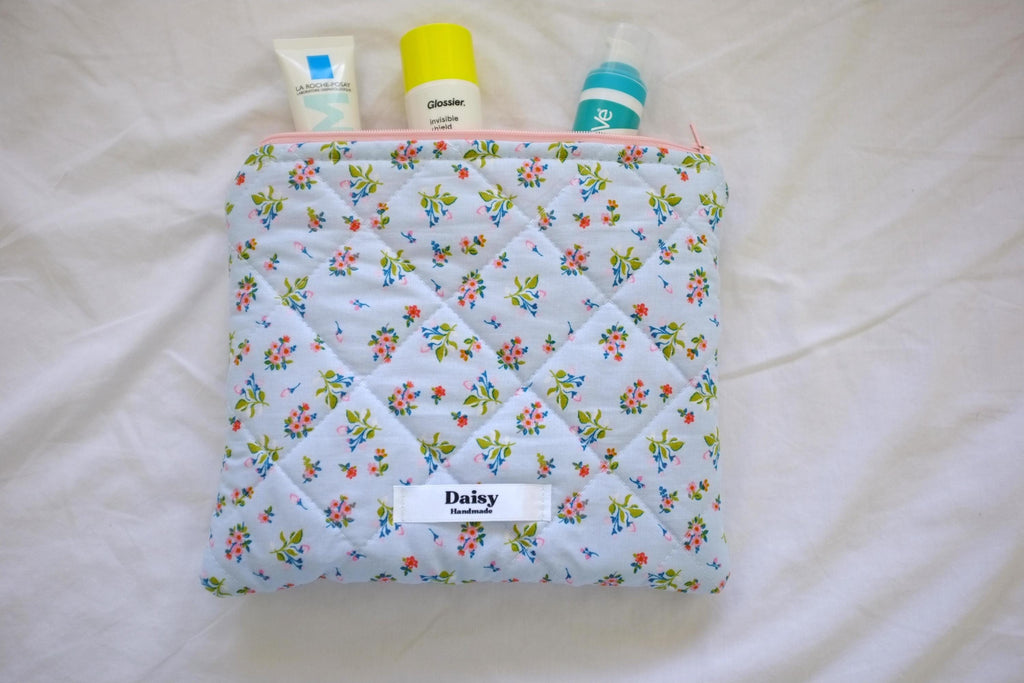 Flat makeup bag blue spring floral