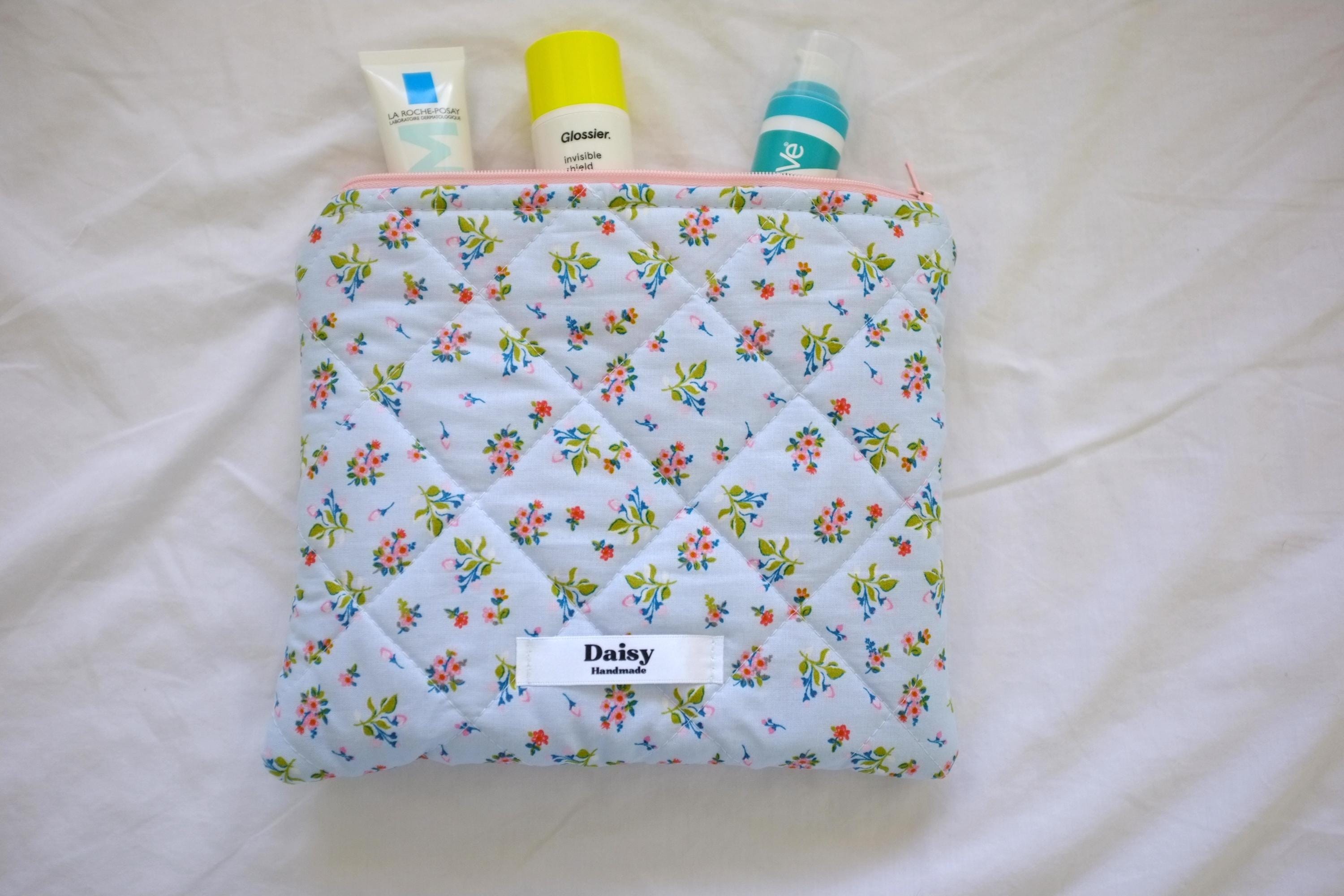 Flat makeup bag blue spring floral