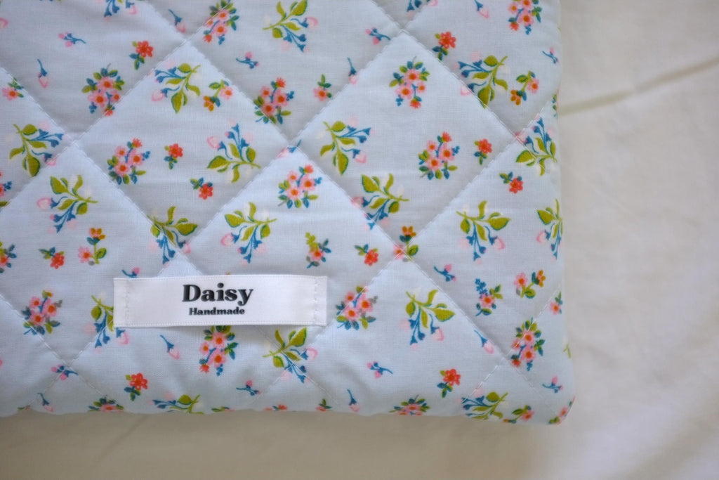 Flat makeup bag blue spring floral