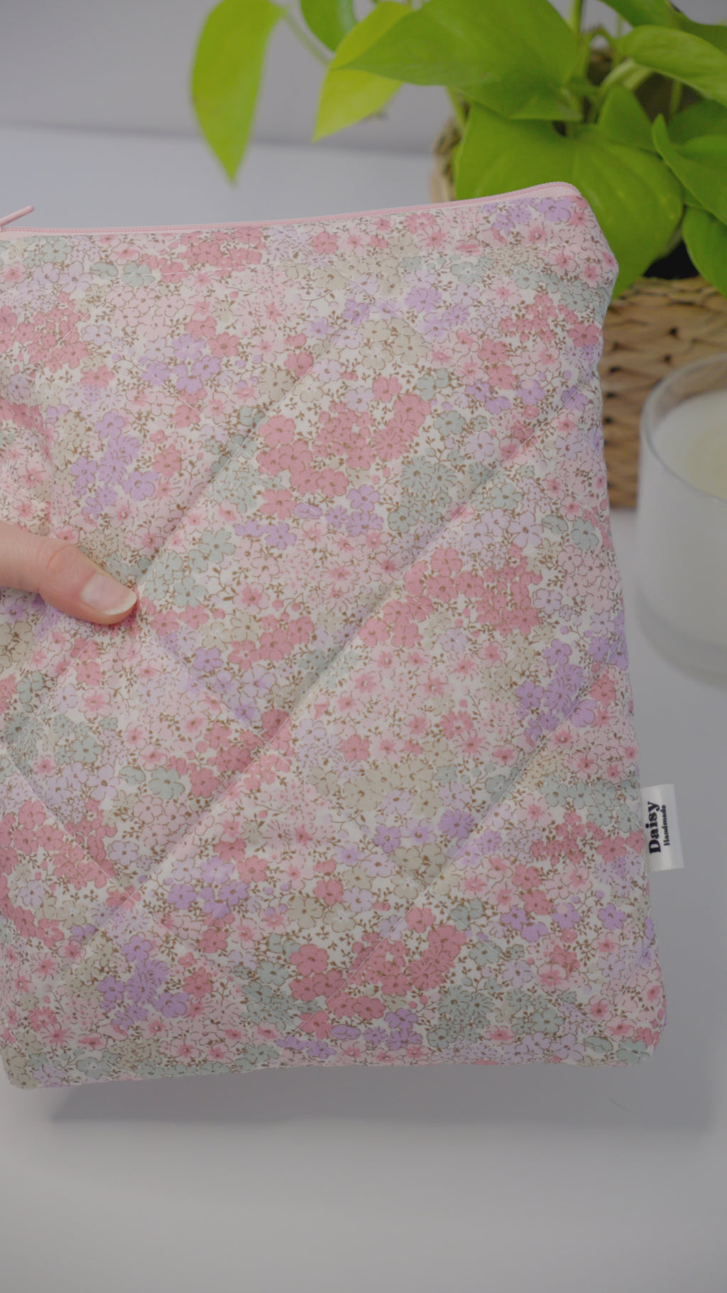 Quilted pink and teal floral book sleeve